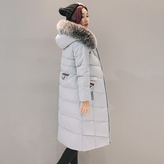 紫檀长款羽绒服女冬季新款韩版时尚气质修身显瘦个性眼睛印花外套